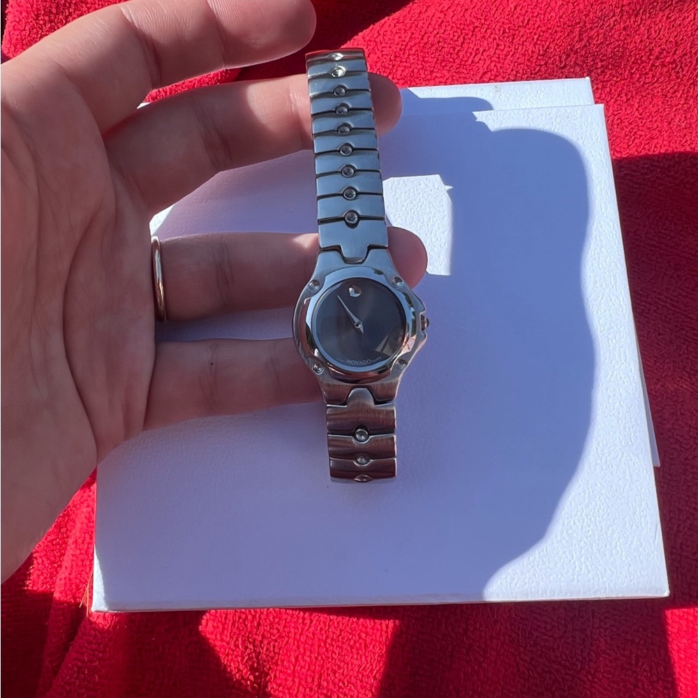 Movado Silver womens Watch with blue dial